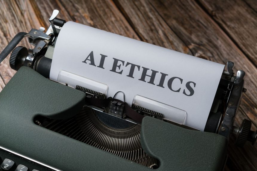 Máquina de escrever com uma folha que traz a expressão “AI Ethics”, em referência à ética no uso da inteligência artificial.